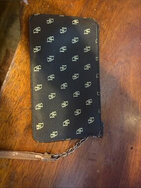 Dooney and  Bourke Monogram Wristlet Clutch in Dark Brown and gold